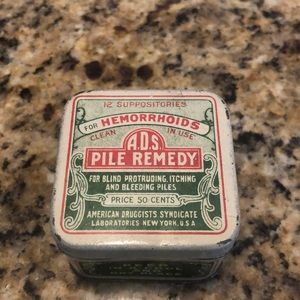 Vintage hemorrhoids suppositories tin